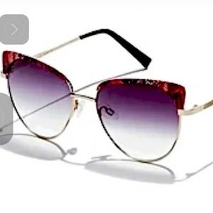 Embrace your inner supermodel with these sleek and edgy cat-eye Sunglass…